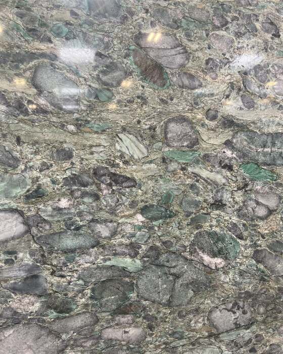 A full stone slab in the yard at Beautiful Granite & Marble