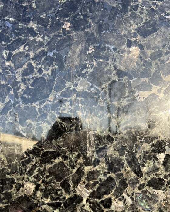 A full stone slab in the yard at Beautiful Granite & Marble