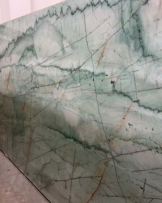 A full stone slab in the yard at Beautiful Granite & Marble