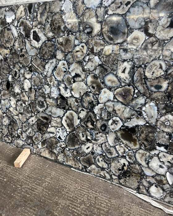 A full stone slab in the yard at Beautiful Granite & Marble
