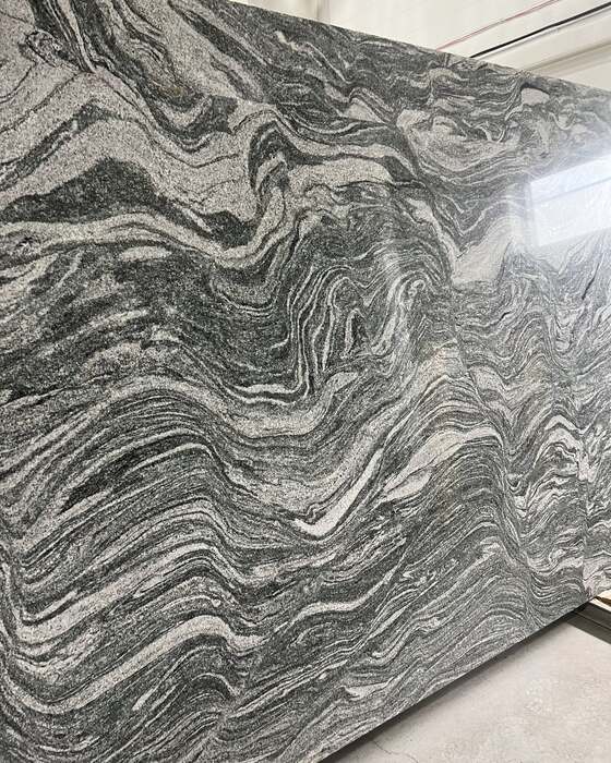 A full stone slab in the yard at Beautiful Granite & Marble