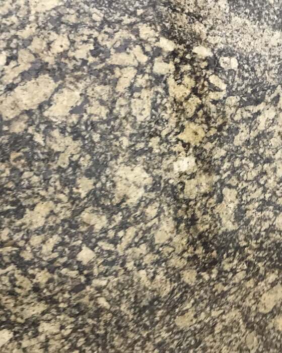 A full stone slab in the yard at Beautiful Granite & Marble