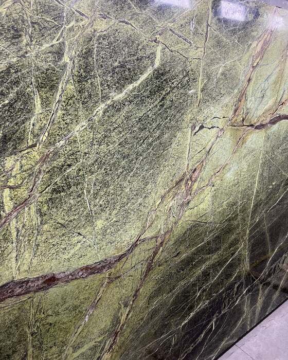 A full stone slab in the yard at Beautiful Granite & Marble