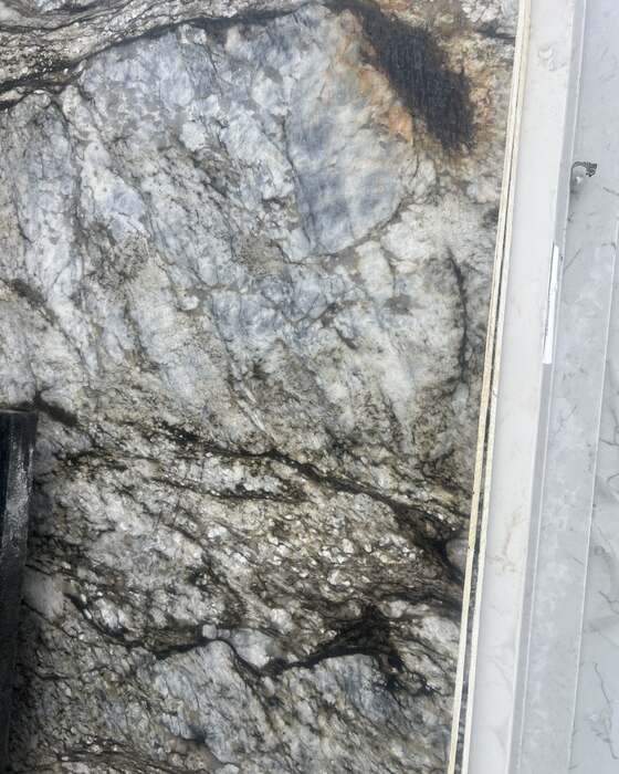 A full stone slab in the yard at Beautiful Granite & Marble