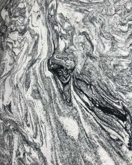 A full stone slab in the yard at Beautiful Granite & Marble